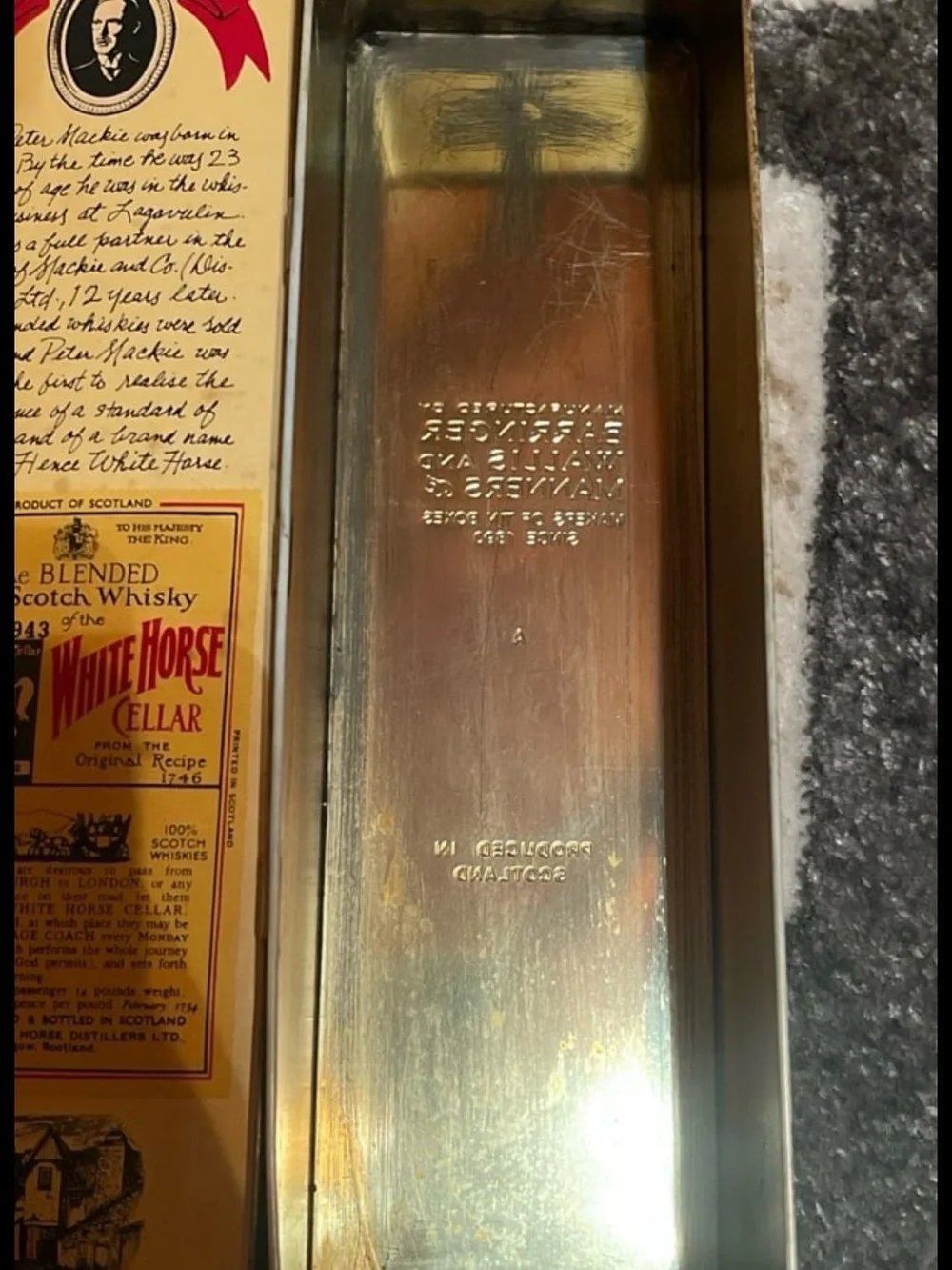 Vintage white horse Scottish whiskey tin. Good condition.